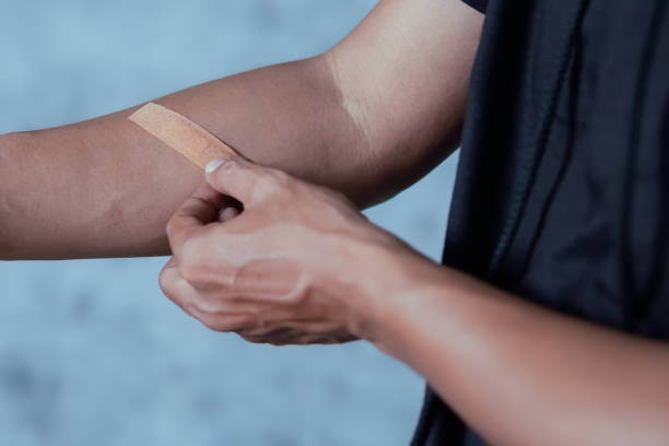 istock A man putting a plaster medic on his arm 1492645078