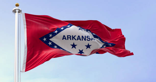 istock Arkansas state flag waving in the wind on a clear day 1492648153