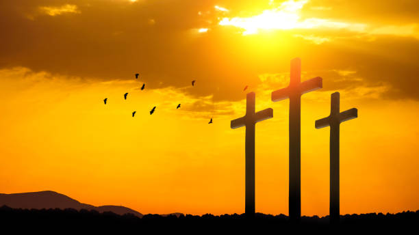 istock Good Friday concept. Cross in arm on sky background. 1492648491