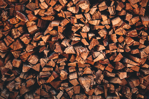 Pile of firewood texture abstract background