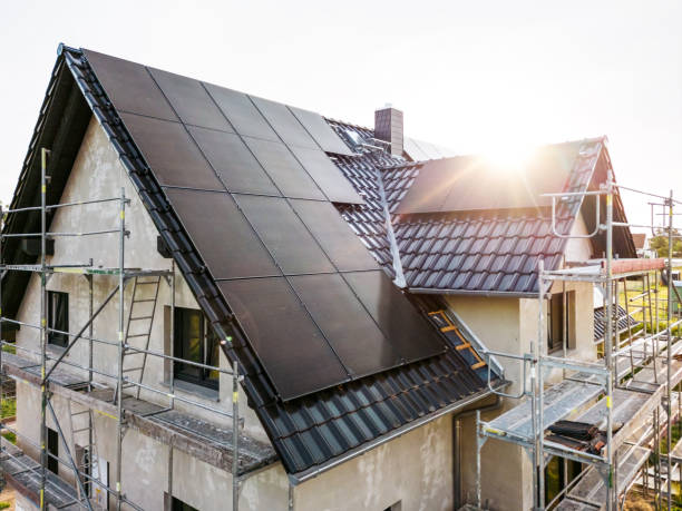 Construction site of a sustainable single family house with solar panels stock photo