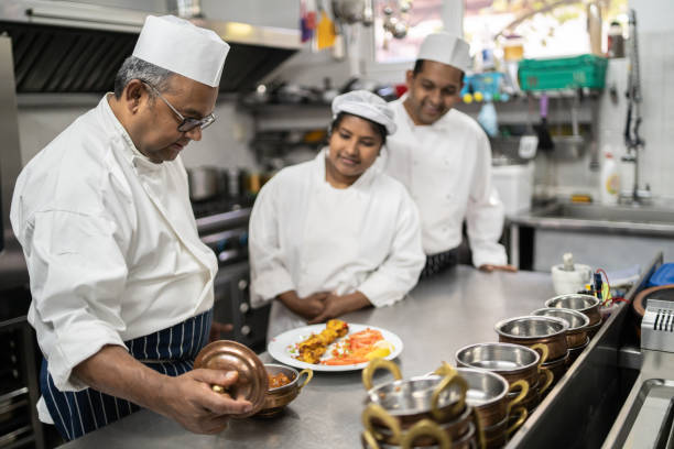 istock Head chef checks the restaurant food before serving 1492656993