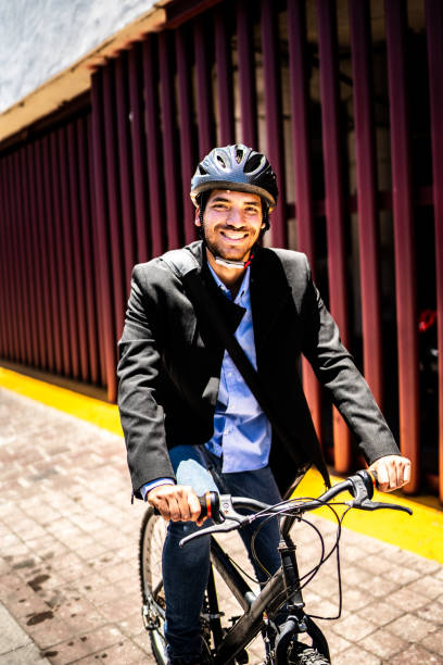 istock Portrait of young man using bicycle outdoors 1492658446