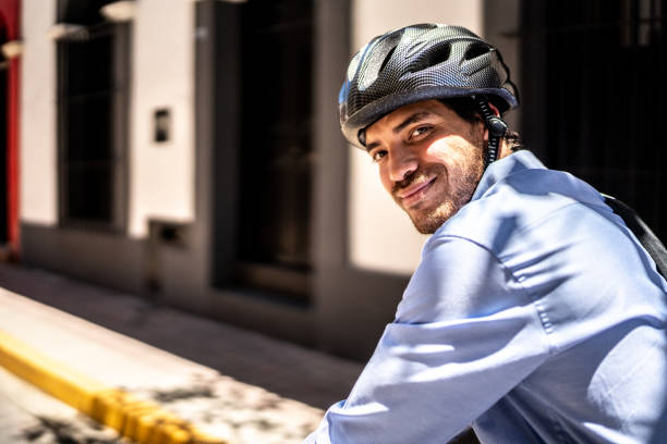 istock Portrait of young man using bicycle outdoors 1492658539