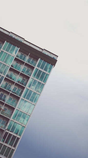 istock Minimal Tipping Building View with Sparse Copy Space Sky Strange Perspective 1492659992