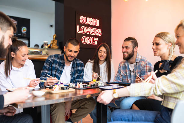 istock Friends out for sushi 1492661280