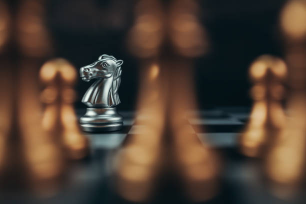 istock chess piece on chess board game for ideas, challenge, leadership, strategy, business, success or abstract concept. 1492663901