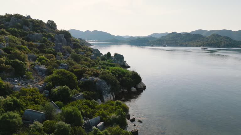 Simena - submerged ancient Lycian city Kekova island Ruins of ancient architecture, aerial view of sunken historical sunken city, place to explore submarine, clean submarine, discovery point for divers, a boat for a cruise in the sunken city