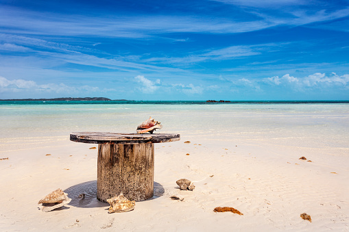Abandoned table on the beach about to flood with the tide, Five Cays, Providenciales, Turks and Caicos