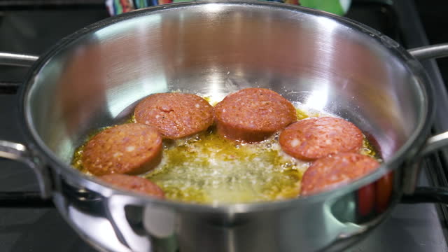 Preparing Turkish sausage (sucuk)