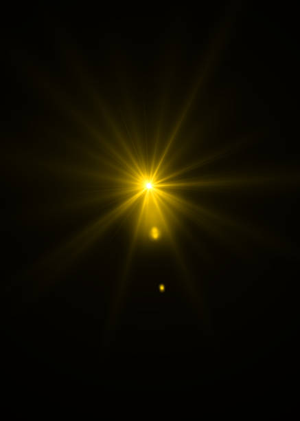 istock Lens flare light on black background. Lens flare glow light effect on black background. Easy to add overlay or screen filter over photos 1492668948