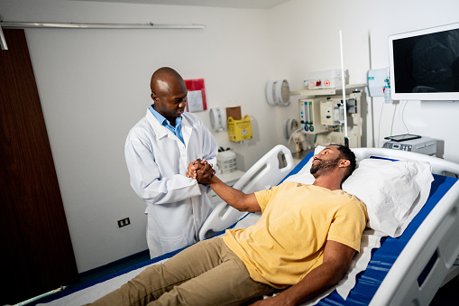 Doctor talking to a patient in the hospital