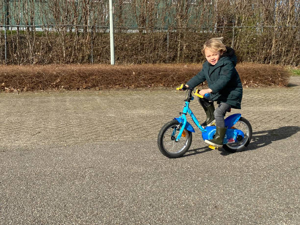 istock Toddler boy Learning to bike 1492672252
