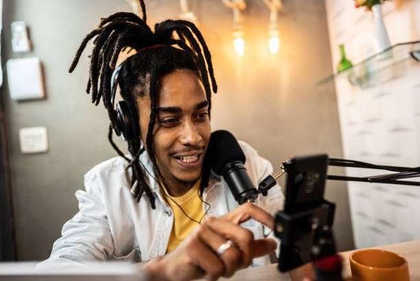 istock Young man doing a livestream with his phone 1492674791
