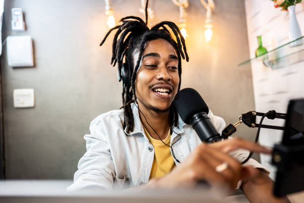 istock Young man doing a livestream with his phone 1492674808
