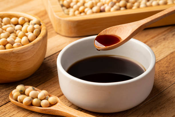 istock Soy sauce in wooden spoon 1492677111