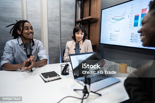istock Coworkers during the recording of a podcast show 1492677620