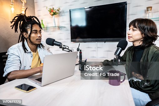 istock Coworkers during the recording of a podcast show 1492677770