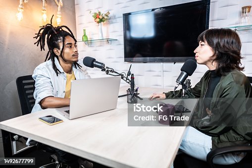 istock Coworkers during the recording of a podcast show 1492677799
