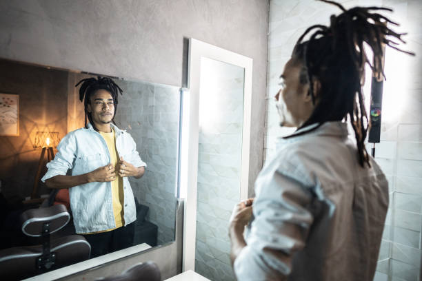 istock Young actor man looking in the mirror on dressing room of backstage 1492678104