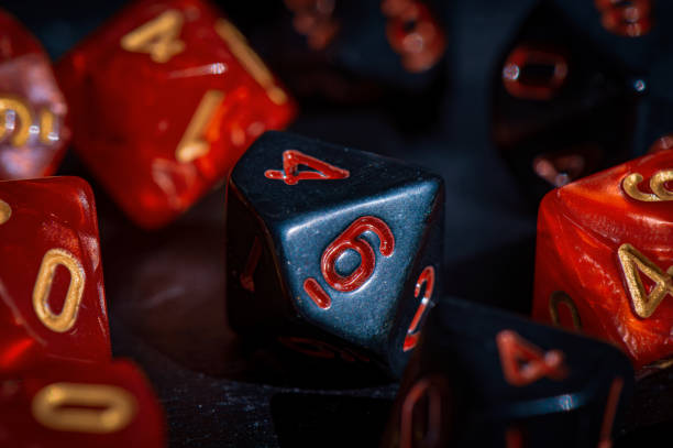 istock Close-up of a black role-playing die 1492680503
