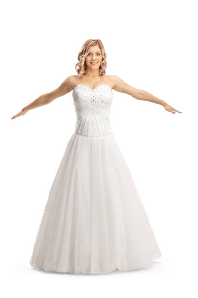 istock Beautiful bride in a gown spreading arms 1492688162