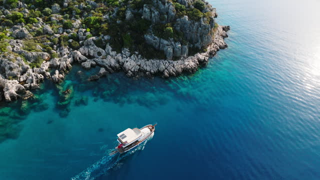 Simena - submerged ancient Lycian city Kekova island Ruins of ancient architecture, aerial view of sunken historical sunken city, place to explore submarine, clean submarine, discovery point for divers, a boat for a cruise in the sunken city