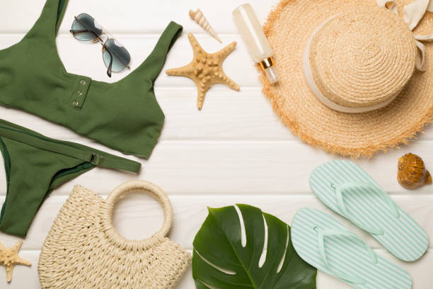 istock Beach accessories on wooden background, flat lay 1492691757