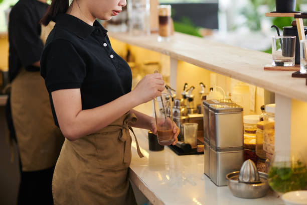 istock Coffeeshop Barista Making Drink 1492698798
