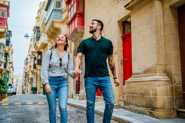 istock Young couple enjoying a walk in Valletta, Malta 1492699081