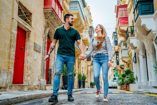 istock Young couple enjoying a walk in Valletta, Malta 1492699102