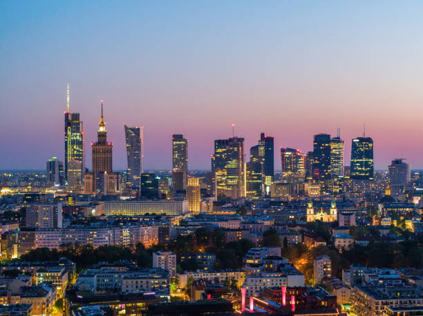 Warsaw city center at dusk, moody aerial landscape Warsaw city center at dusk, moody aerial landscape warsaw stock pictures, royalty-free photos & images