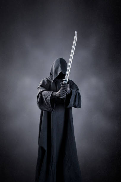 istock Samurai warrior with katana sword over dark misty background 1492702037