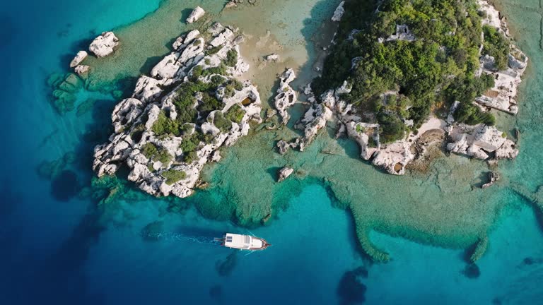 Simena - submerged ancient Lycian city Kekova island Ruins of ancient architecture, aerial view of sunken historical sunken city, place to explore submarine, clean submarine, discovery point for divers, a boat for a cruise in the sunken city