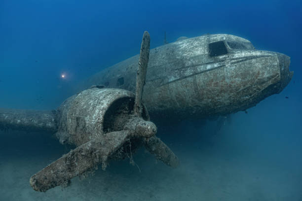 istock Wreck of an old passenger plane underwater. 1492707832