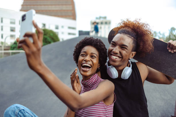 istock Cheerful friends filming social media content 1492718671