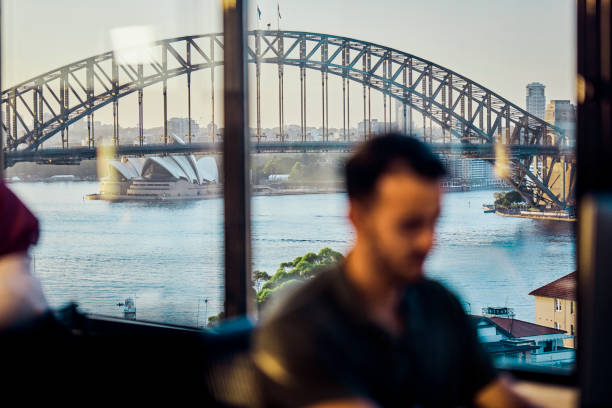 Young male worker who has landed the dream job in an Australian office.