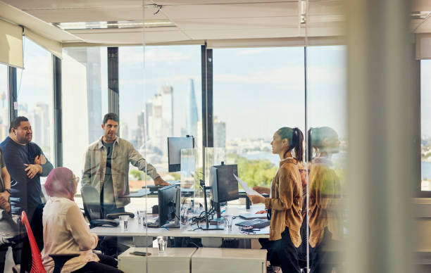 istock Teamwork and collaboration in a tech-driven Australian office with stunning Sydney views. 1492719688