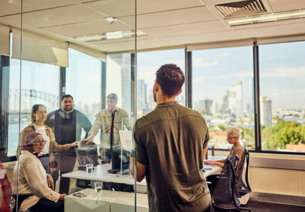 istock Teamwork and collaboration in a tech-driven Australian office with stunning Sydney views. 1492719689