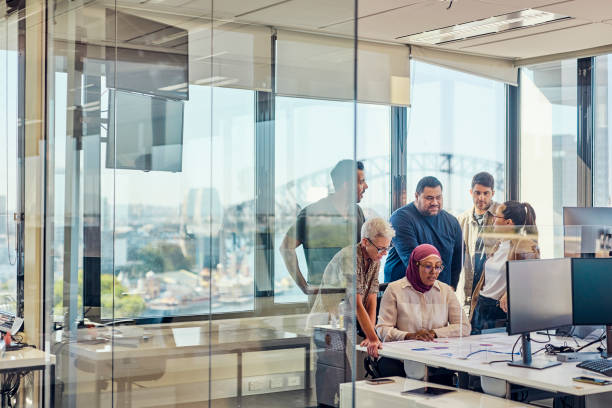 A multicultural team of professionals fostering collaboration and innovation in Sydney. stock photo