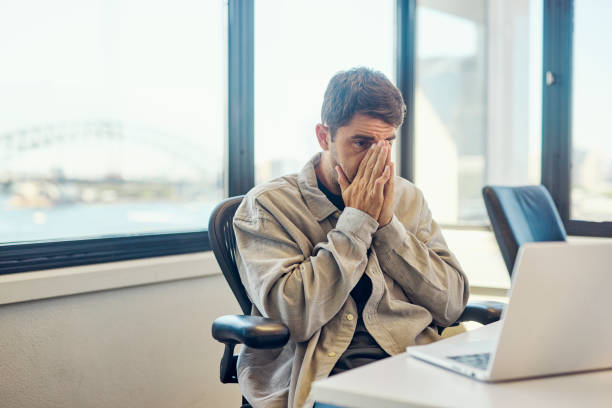 istock Young office worker struggling with stress in the workplace 1492720160