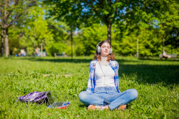 istock Relaxed woman resting listening audio 1492733436