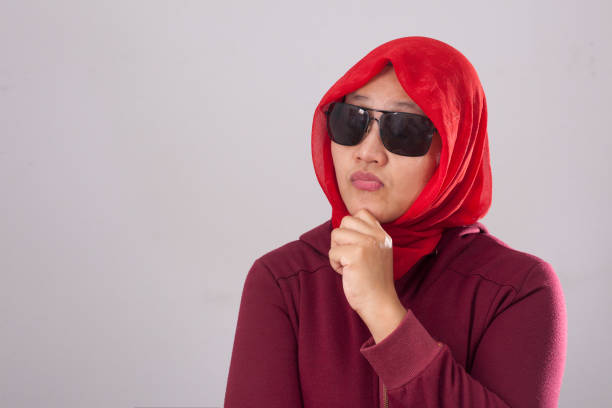 istock Muslim Lady in Red Thinking Something 1492739468
