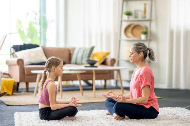 istock Mother and Daughter Meditation 1492743018