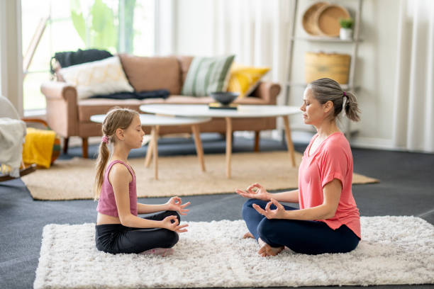 istock Mother and Daughter Meditation 1492743022