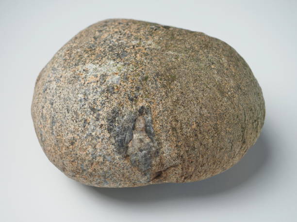 istock Large stone on white background, close-up, macro photography. 1492750376