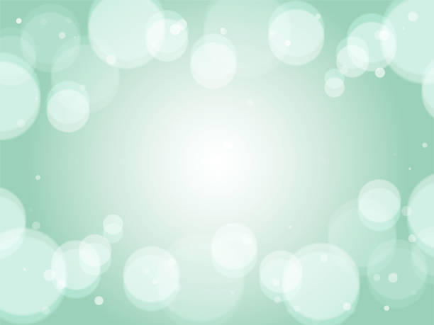 istock Abstract background of a bright and pale fancy image with soap bubbles floating _ light green 1492754065