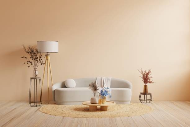 istock Modern minimalist interior wall mockup with sofa and decor on cream color wall. 1492754508