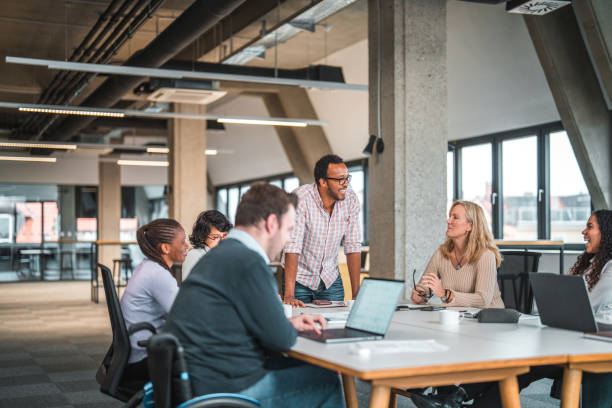 istock Bright Day at the Office, Business Meeting is Being held 1492754736