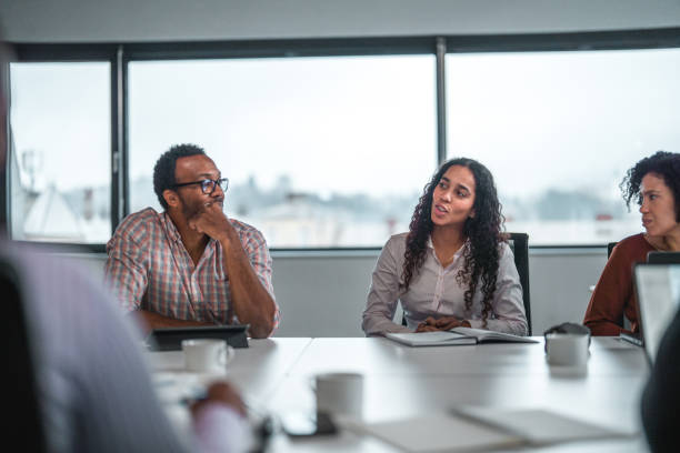 istock Waist up Shot Black Team Members at a Work Meeting 1492754737